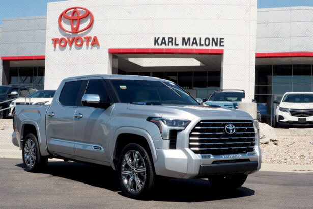 Karl Malone Toyota dealership exterior with cars on display