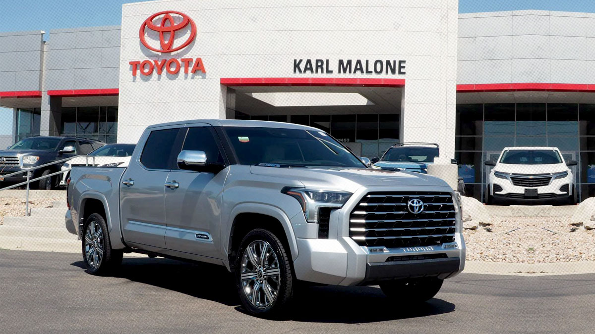 Karl Malone Toyota dealership exterior with cars on display